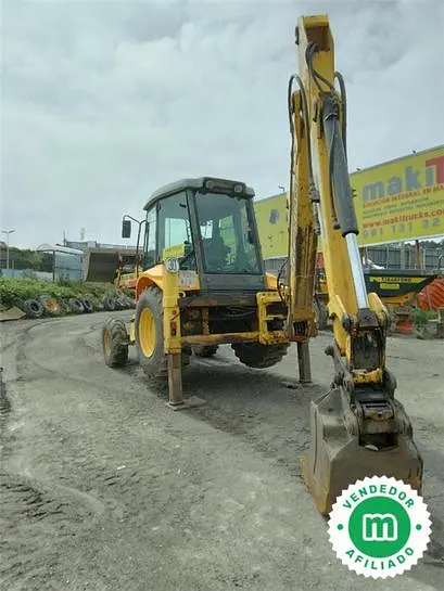 New Holland LB95 backhoe loader
