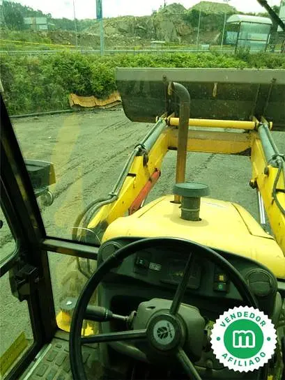 Retro cargadora mixta New Holland LB95 2007