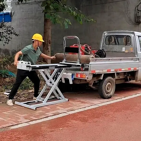 Mesa Elevadora de tijera Eléctrica con carro manual 300kg (120x70)
