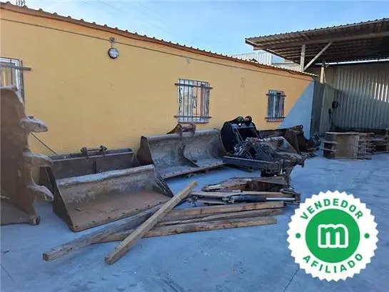 Excavator buckets and loader attachments